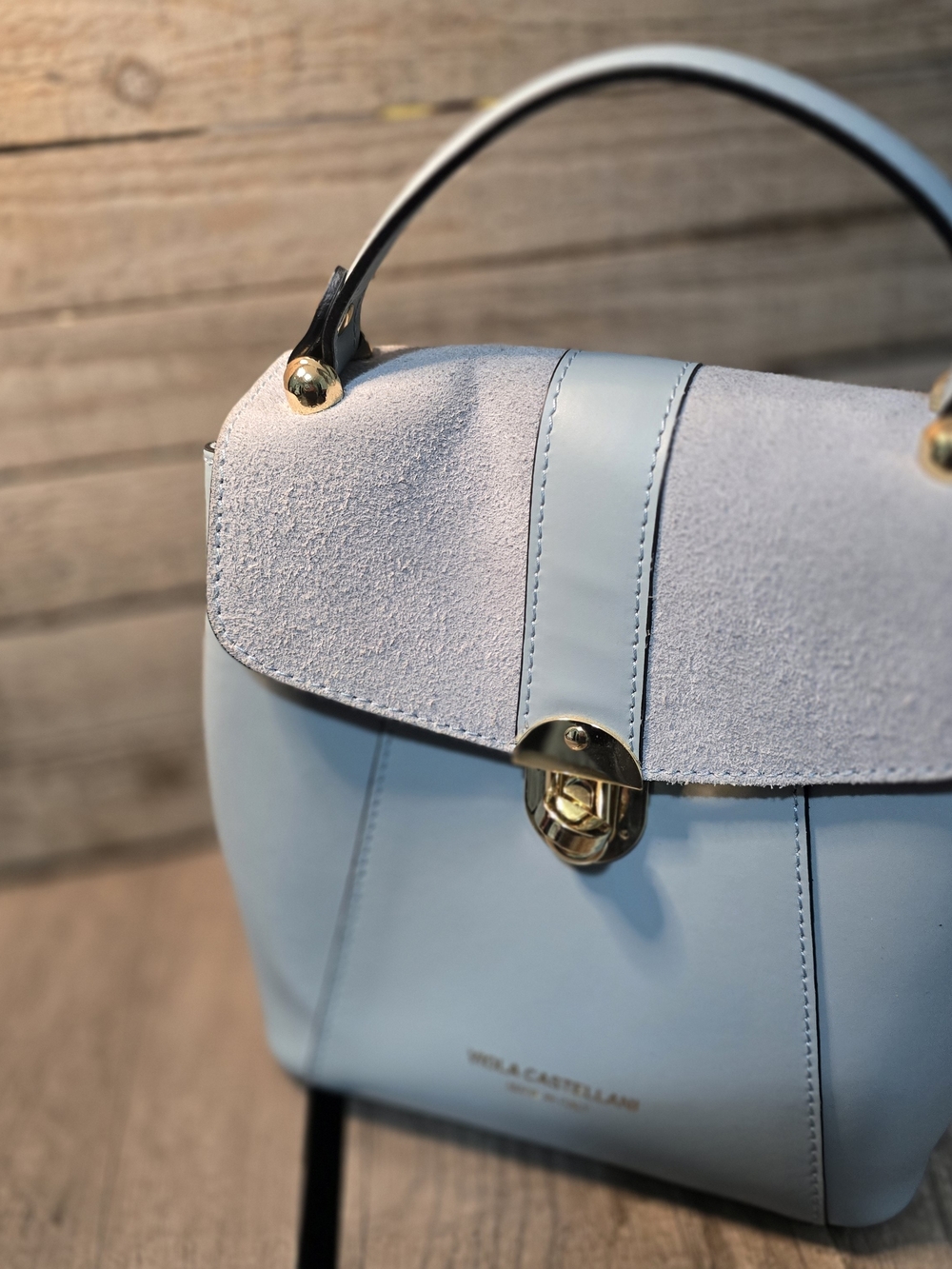 Viola Castellani light blue Italian leather bag.